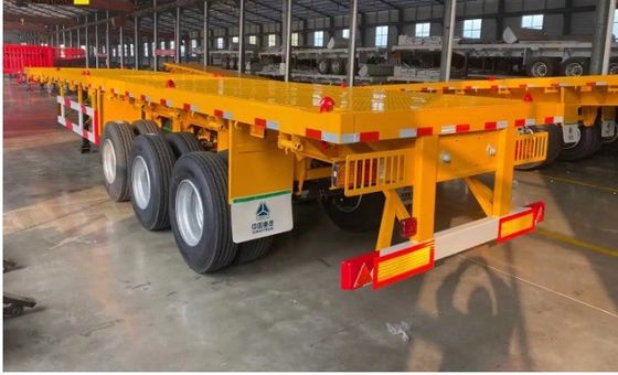 Semi remolque de cama plana de 40 a 60 toneladas con 3 ejes personalizable para el transporte de contenedores