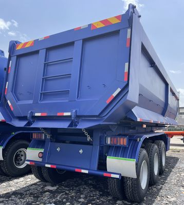 Contenedor inferior 3 Ejes traseros Semi remolque de descarga con resorte de hojas y 28t de trabajo pesado