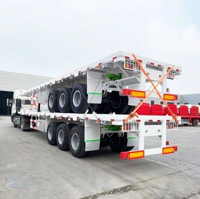 Transporte de mercancías pesadas 20 pies 40 pies contenedor semirremolque de lecho plano con 3 ejes y acero