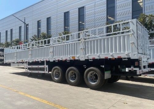 Semirremolque para el transporte de 60-100 toneladas de materiales de construcción y solicitud del cliente