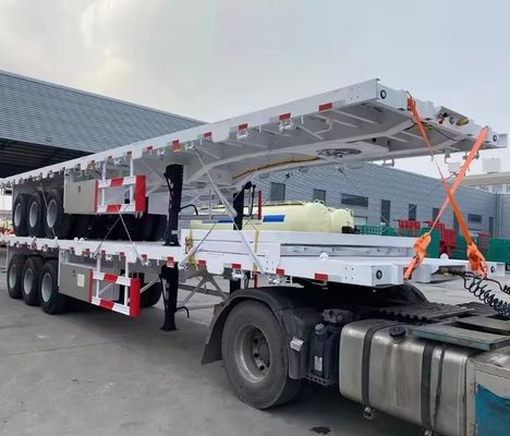 90T de acero de carga útil máxima 20FT 40FT contenedor de semirremolque de cama plana con neumático 12r22.5
