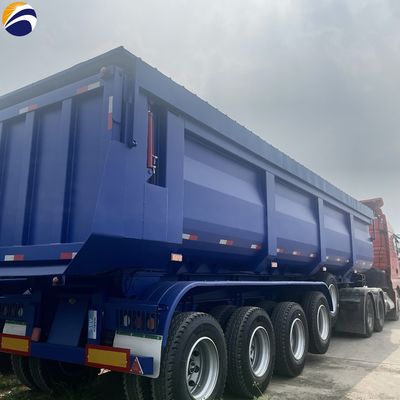 4 Ejes Semi remolque hidráulico trasero con extremo de descarga con inclinación para el transporte de grano de piedra arenisca