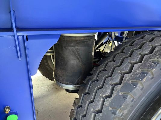 4 Ejes Semi remolque hidráulico trasero con extremo de descarga con inclinación para el transporte de grano de piedra arenisca