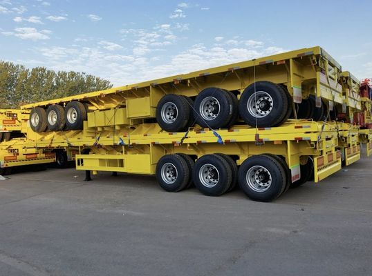 Semiremolque de plataforma plana de 100 toneladas de carga útil máxima para el transporte de contenedores y cargas a granel