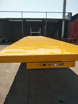 Semiremolque de plataforma plana de 100 toneladas de carga útil máxima para el transporte de contenedores y cargas a granel