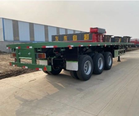 2 3 4 Ejes 30-100 toneladas Contenedor de cama plana Semirremolque para el transporte de carga a granel